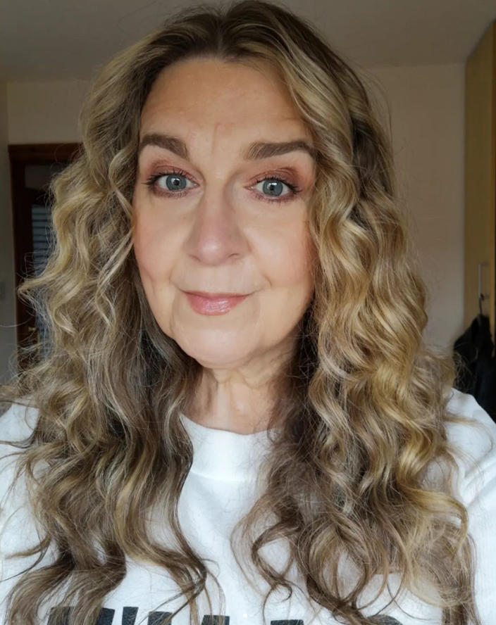 Curly Long Length Hairstyle For Women Over 50