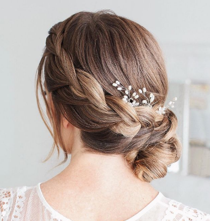 French Braid Side Bun Deep Side Part Hairstyle
