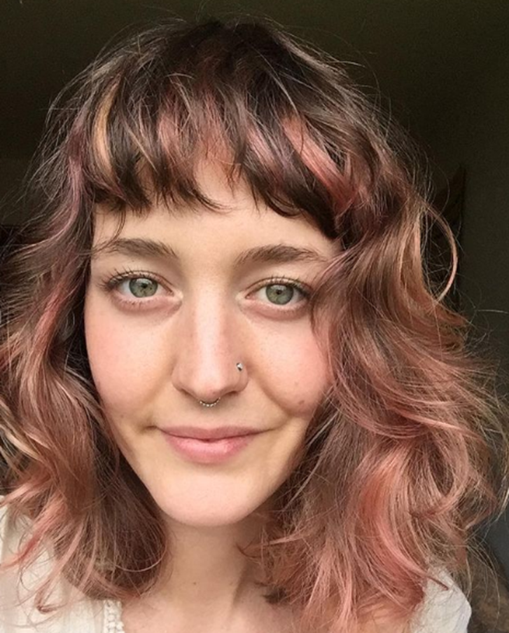 Pastel Pink Highlights With Front Bangs Medium Length Layered Hairstyle