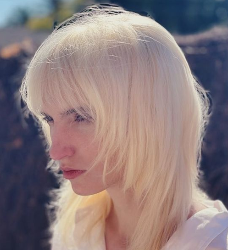 Platinum Blonde Wolf Cut With Bangs Hairstyle