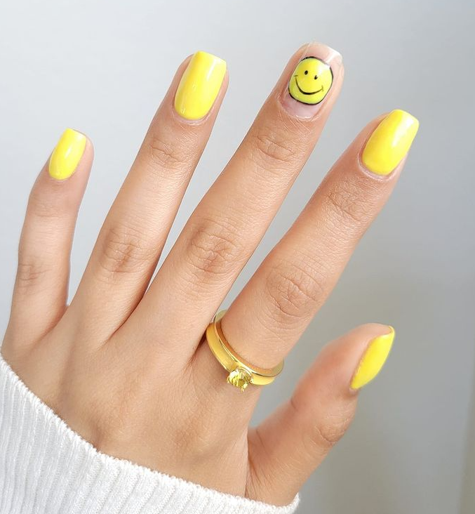 happy yellow nail art