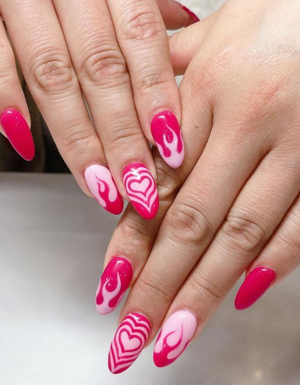 flaming pink heart nail design