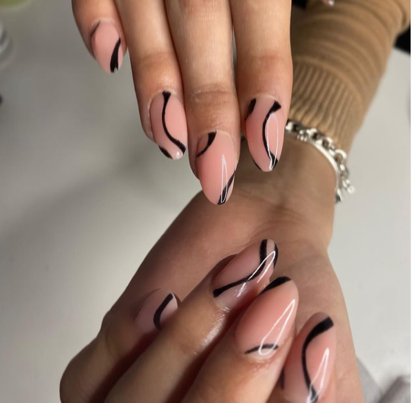 Elevate your nail game with mesmerizing swirl nail designs! Explore unique swirl patterns and nail art ideas for a trendy and eye-catching look."