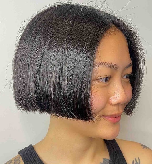 A Blunt Bob Middle Part Sew In Hairstyle