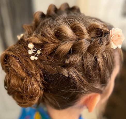 Braided Bun With Flowers Hairstyle