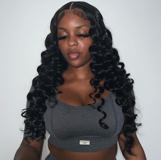 Curly Middle Part Sew In Hairstyle