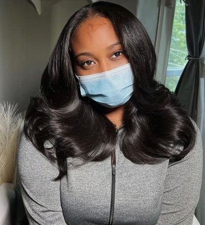 Glossy Middle Part Sew In Hairstyle