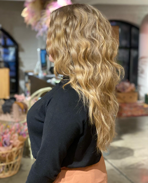 Golden Curly Layered Hairstyle