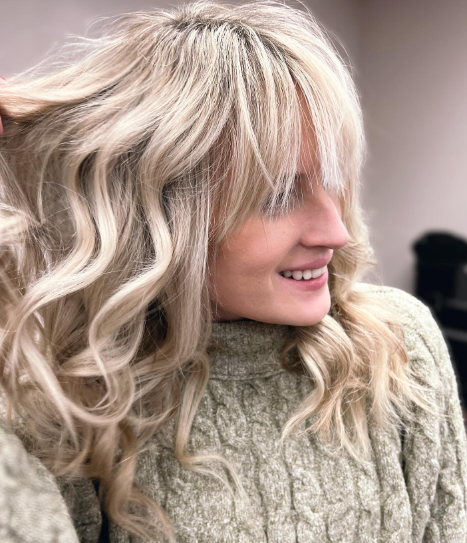 Light Blonde Textured Hairstyle With Bangs