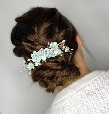 Low Bun With A French Braid Hairstyle For Wedding Guests