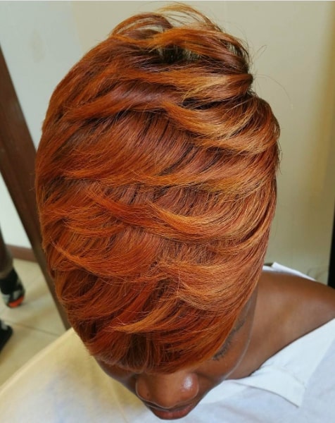 Orange Colored Feathered Short Hairstyle
