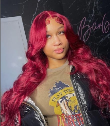 Pink Middle Part Sew In Hairstyle