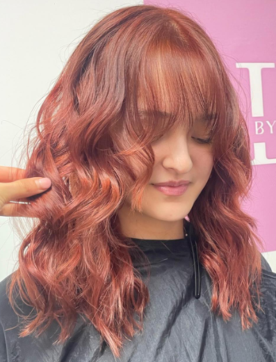 Ruby Fusion Colored Wavy And Wispy Bangs Hairstyle