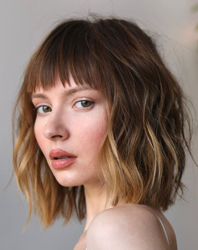 Short Brunette Textured And Wispy Bangs Hairstyle