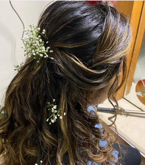 Side Hairstyle with Floral Design  