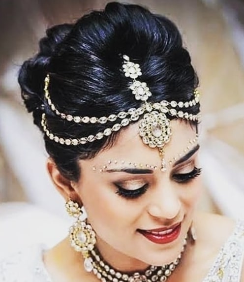 Side Sweep with Twisted High Puff Low Bun Hairstyle for Indian Wedding Function