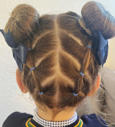 Space bun and back details hairstyle