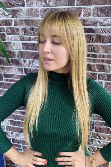 Straight And Long Blonde With Wispy Bangs Hairstyle