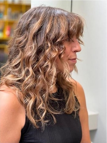 Toffee Highlights in Curly Brown Hair