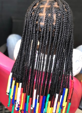 Twin Pony with Knotless Braids And Beads Hairstyle For Kids