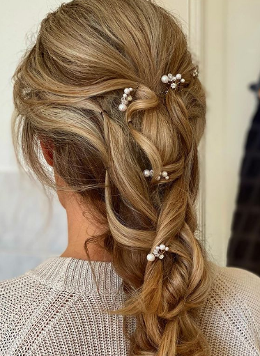Twist With Pearl Pin Hairstyle For Wedding Guests