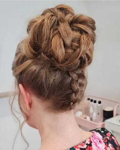 Twisted High Bun Braid Hairstyle For Wedding Guests