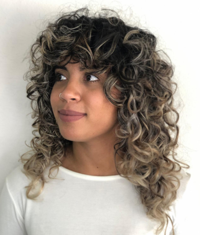 Angled Curly With Pops Of Blonde Haircut For Curly Hair Idea Designs