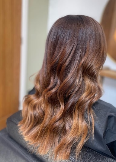 Beach Waves Hairstyles With Caramel Highlights