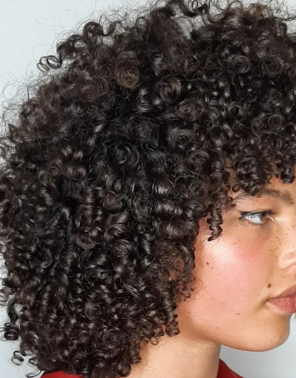 Big Short Curly Hair Style For Women