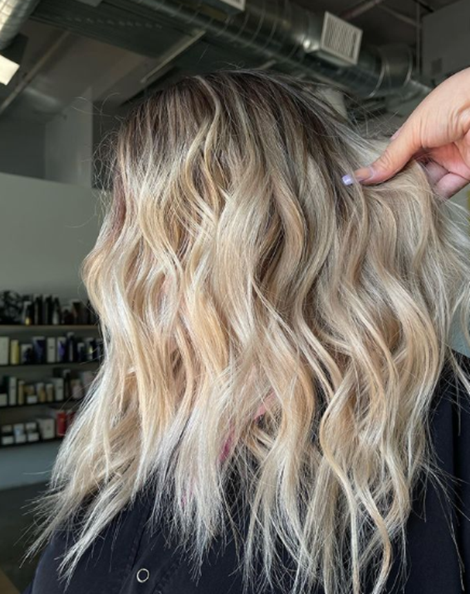 Bright Blonde Long Layered Hairstyle