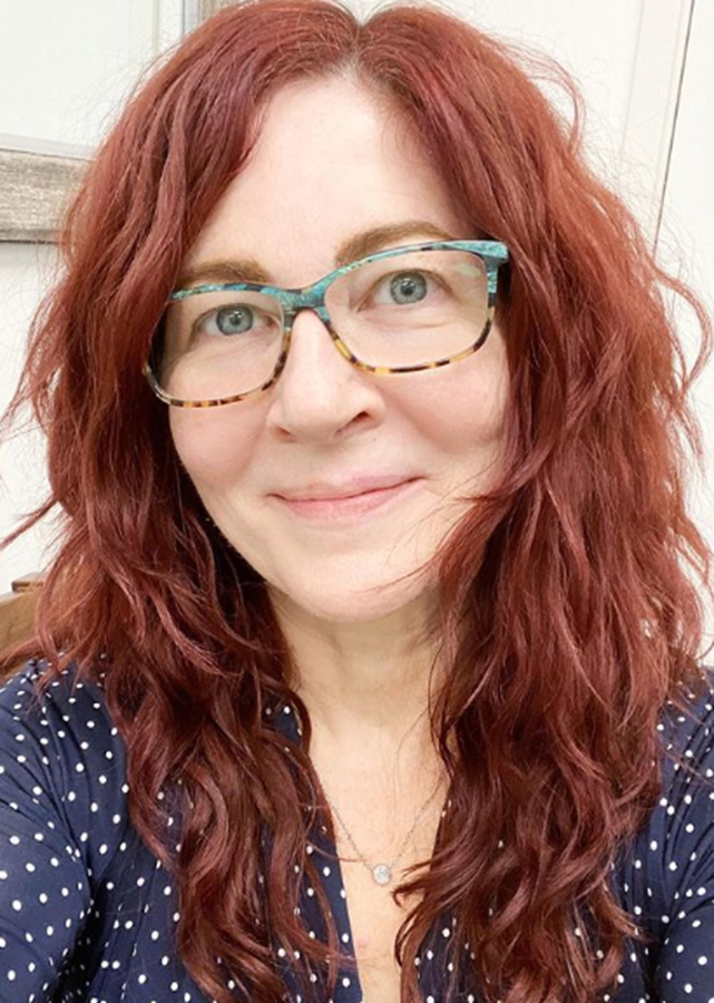 Copper Red Wavy Hairstyle For Women Over 50