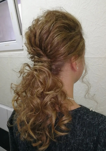 Curled Up Brunette Messy Ponytail Hairstyle