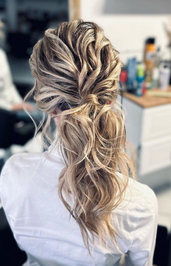 Curly Light Blonde Messy Ponytail Hairstyle
