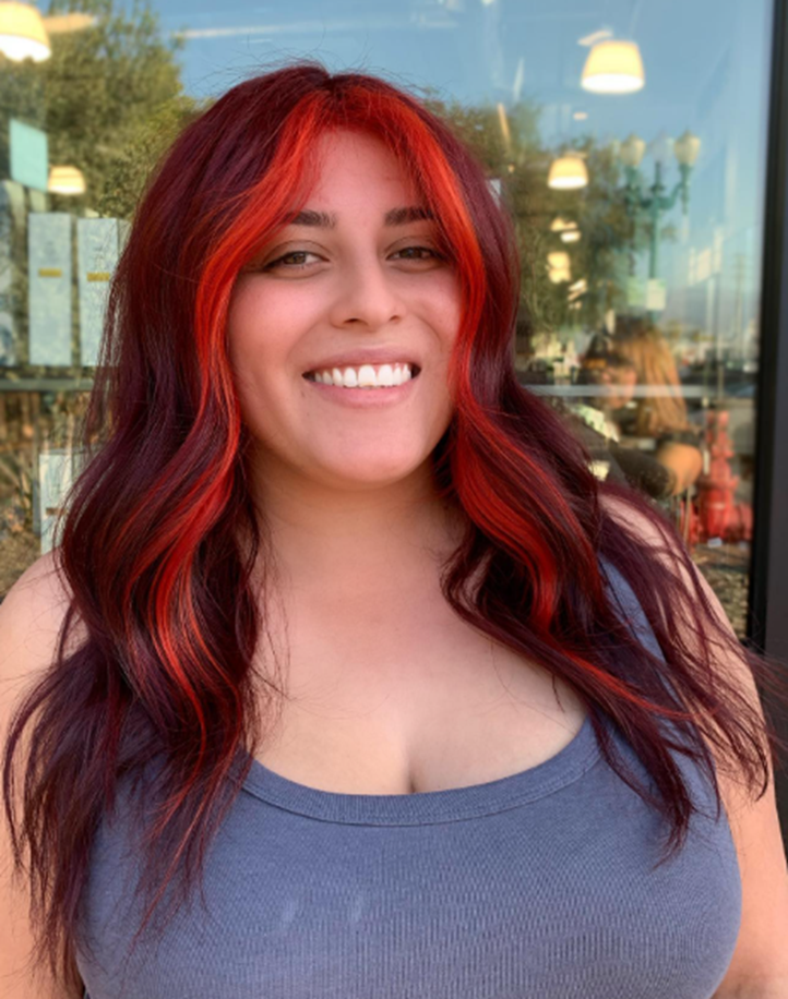Deep Red Pop Hairstyle For A Double Chin