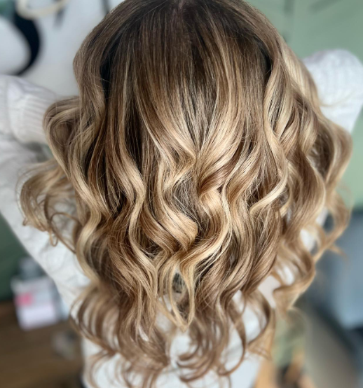 Dimensional Blonde Curly Long Hairstyle