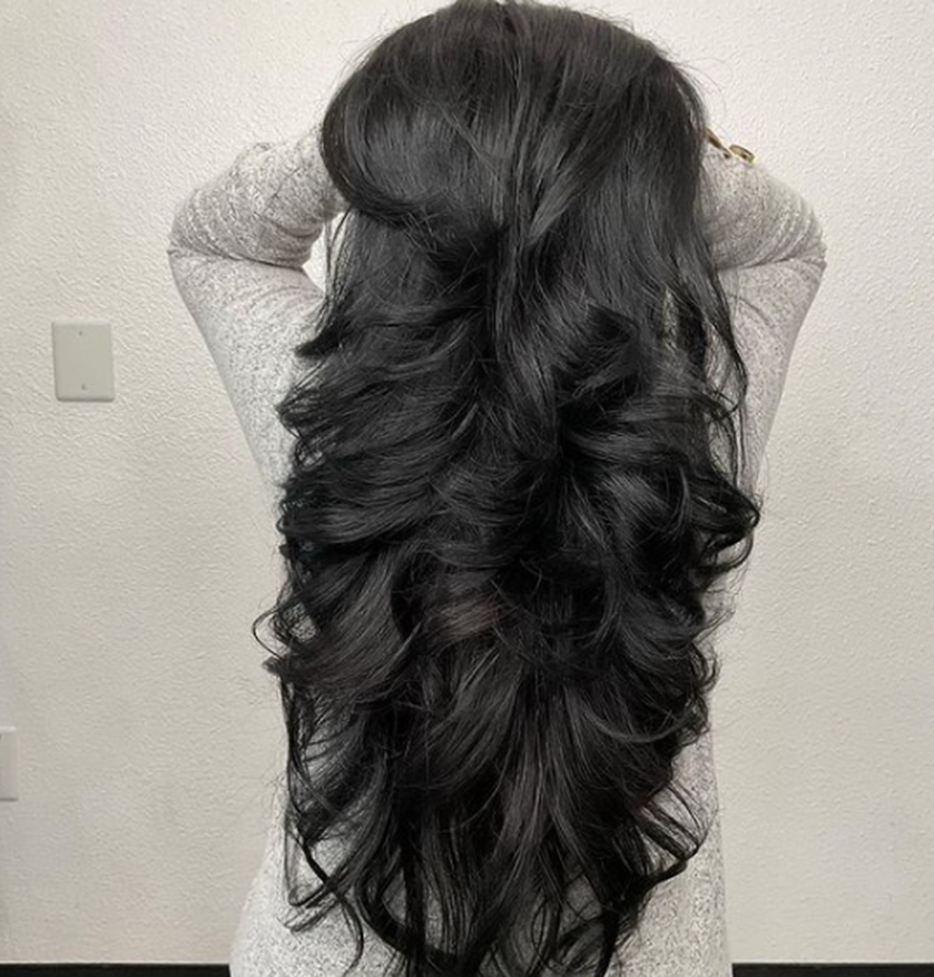 Feathery Blowout Long Layered Hairstyle
