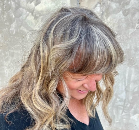 Frizzy Shaggy Hairstyles For Women Over 50 With Bangs