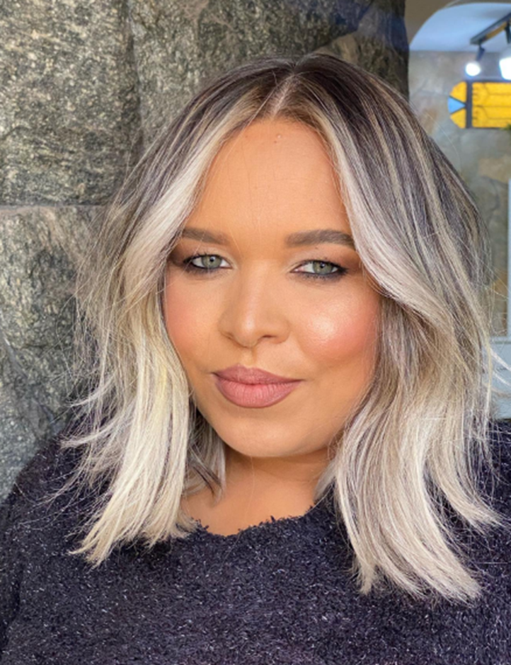 Gray Wavy Bangs Hairstyle For A Double Chin
