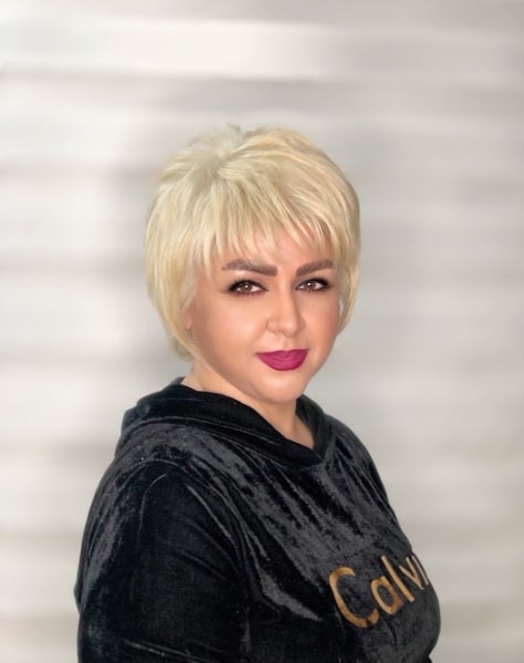 Grey Hair Golden highlight Hairstyles For Women Over 50 With Bangs