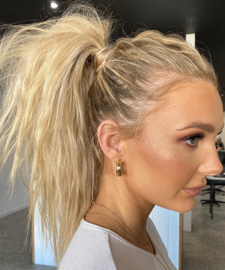 High Layered Blonde Messy Ponytail Hairstyle