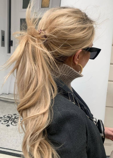Lengthy Ash Blonde Messy Ponytail Hairstyle