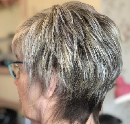 Light Ash Blonde Hairstyle For Women Over 50 With Double Chin