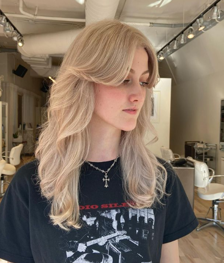 Light Blonde With Side Bangs Long Layered Hairstyle