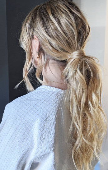 Long Wavy Low Messy Ponytail Hairstyle