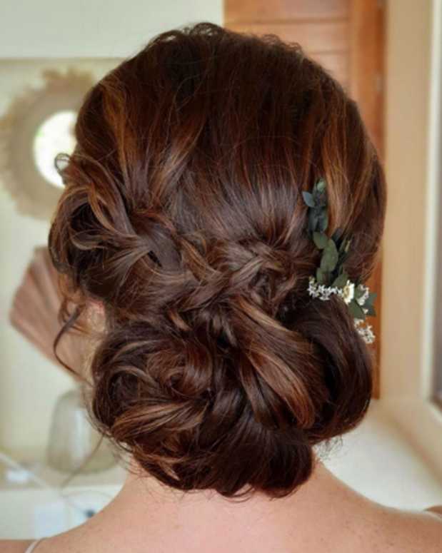 Loose Curly Bun Medium Length Wedding Hairstyle