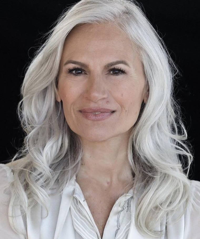 Milky White Wavy Hairstyle For Women Over 50