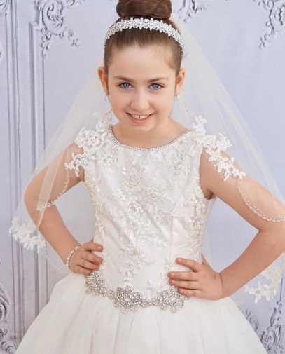 Neat High Bun With Head Band For First Communion Hairstyles