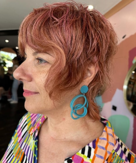 Pink Shaggy Hairstyles For Women Over 50 With Bangs