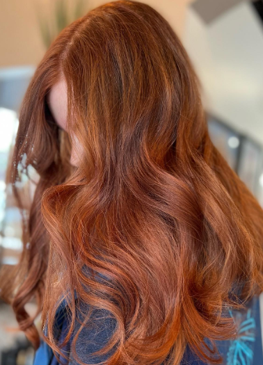 Rusty Red Wavy Long Hairstyle For Women