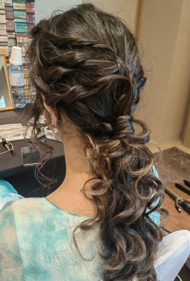 Side Layered And Twisted Curly Messy Ponytail Hairstyle